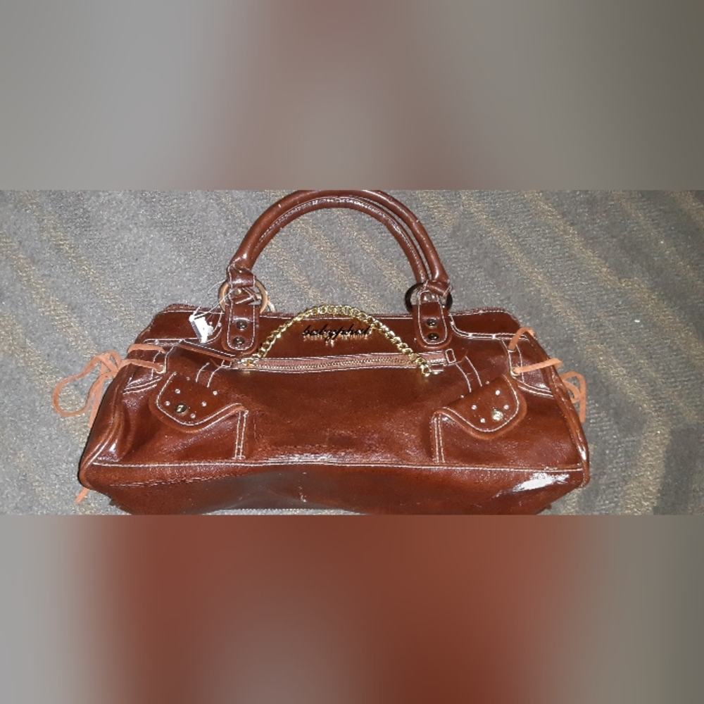 BabyPhat 13x6 lrg/long purse gold hardware brand new a lot of  Imperfections